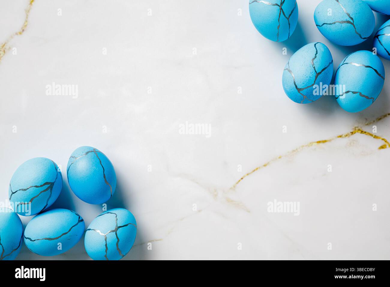 Blue Easter eggs on marble background. Flat lay, top view. Stock Photo