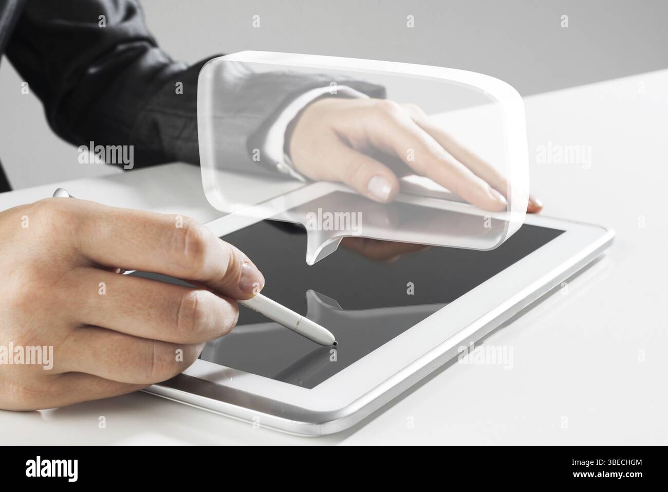 Female hands using graphics tablet and glass icons fly in air. Mixed ...
