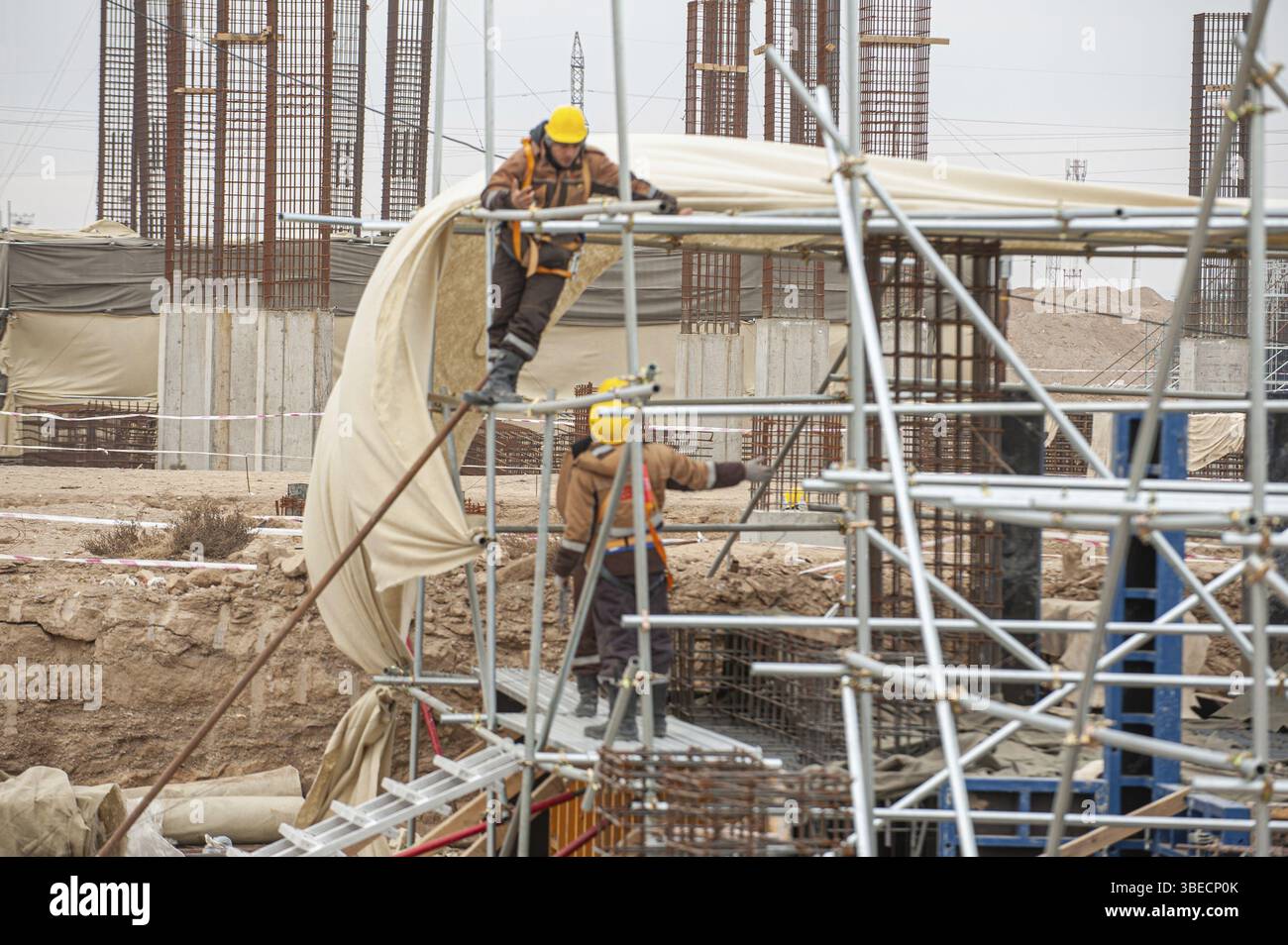 A workers with special equipment in a construction site make formwork Stock Photo