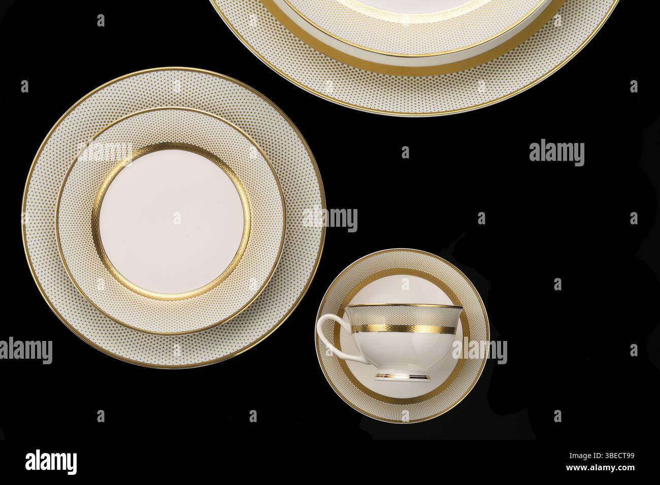A luxury tableware set isolated on black backgroundÐ¼ Stock Photo