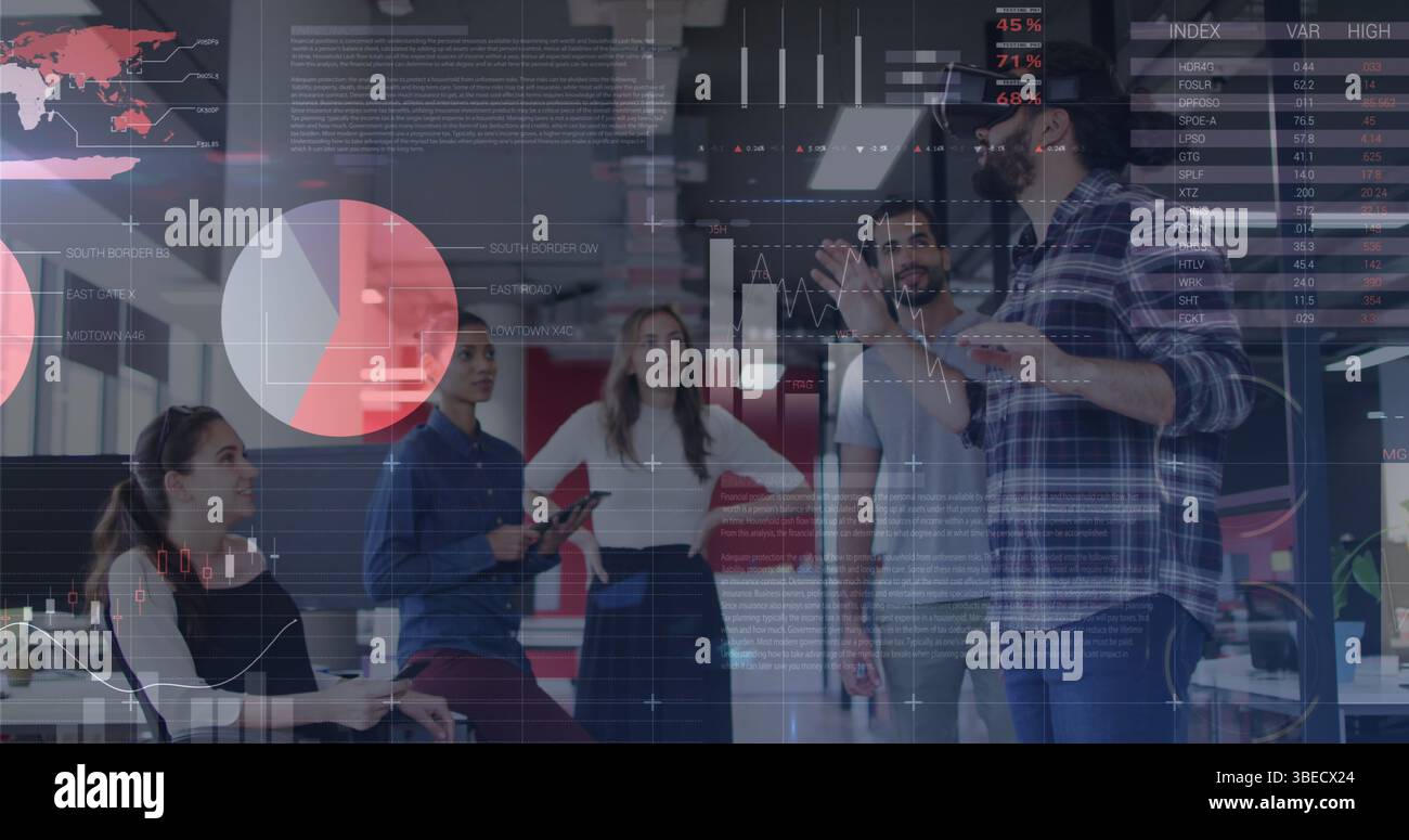 Statistical data processing against man wearing vr headset at office Stock Photo