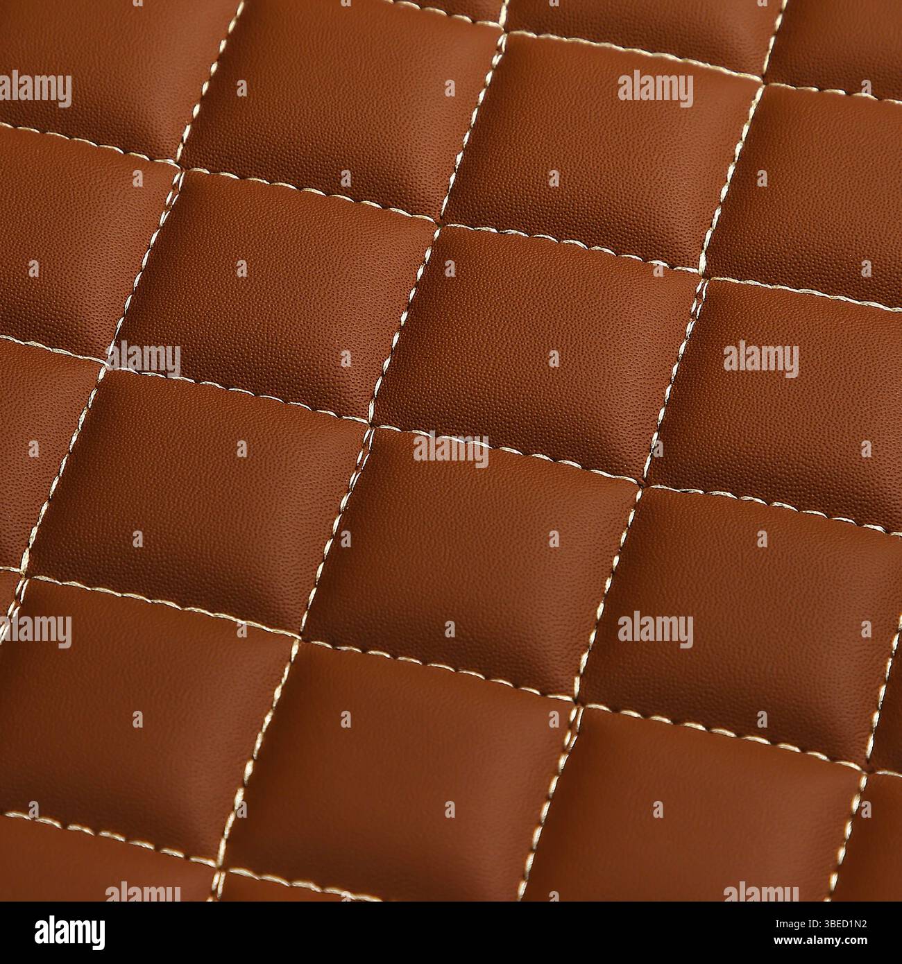 Texture of brown leather background with square pattern and stitch, macro Stock Photo