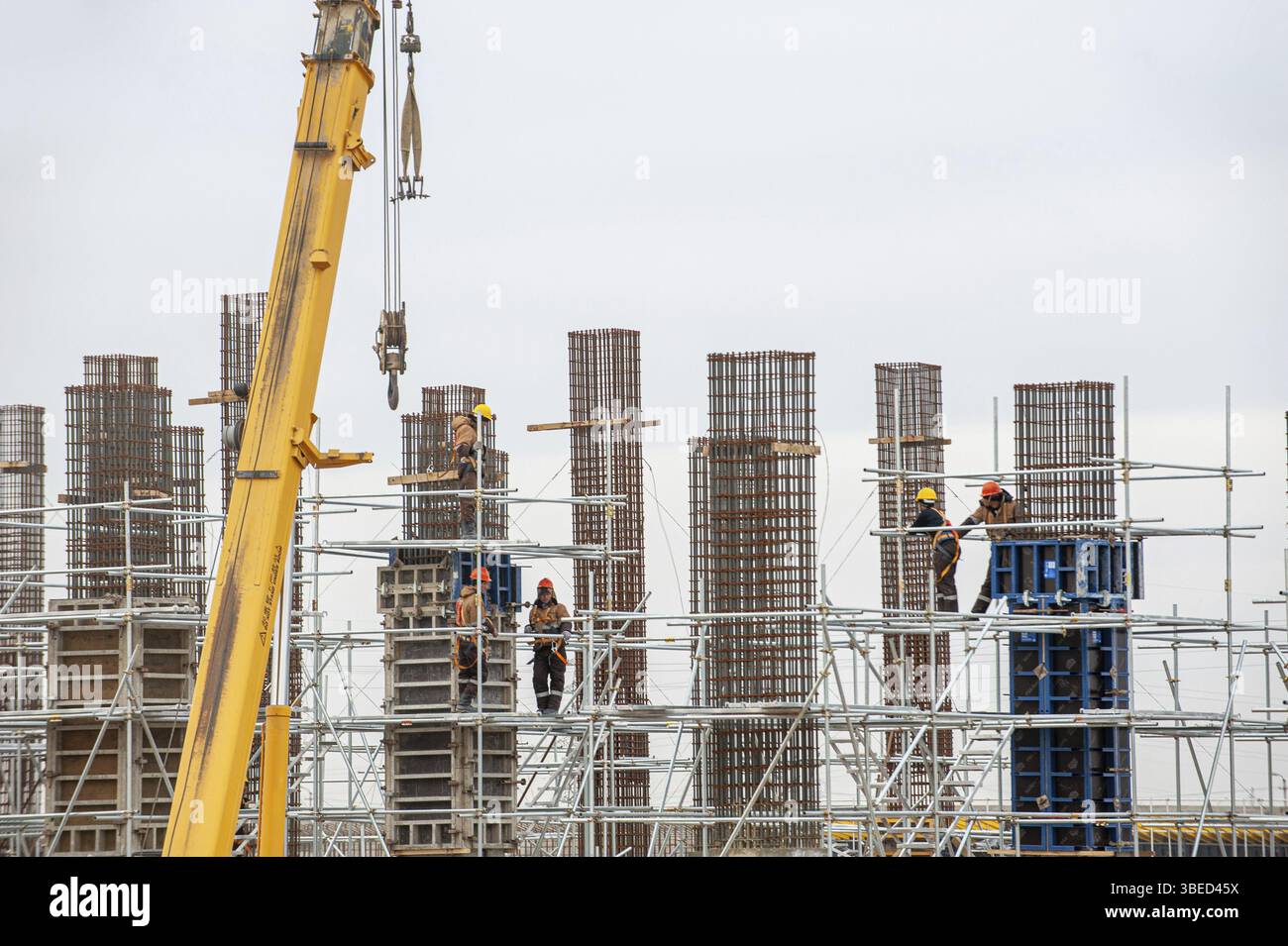 A workers with special equipment in a construction site make formwork Stock Photo