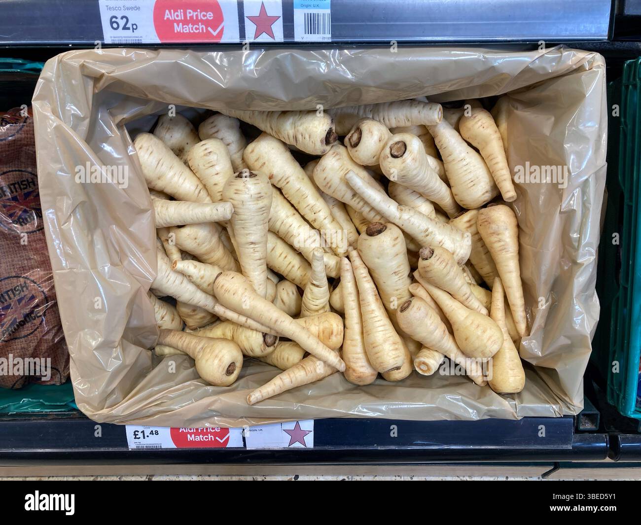Loose Parsnips, Pastinaca sativa, for sale at Tesco supermarket, UK - Smartphone Captured Stock Image