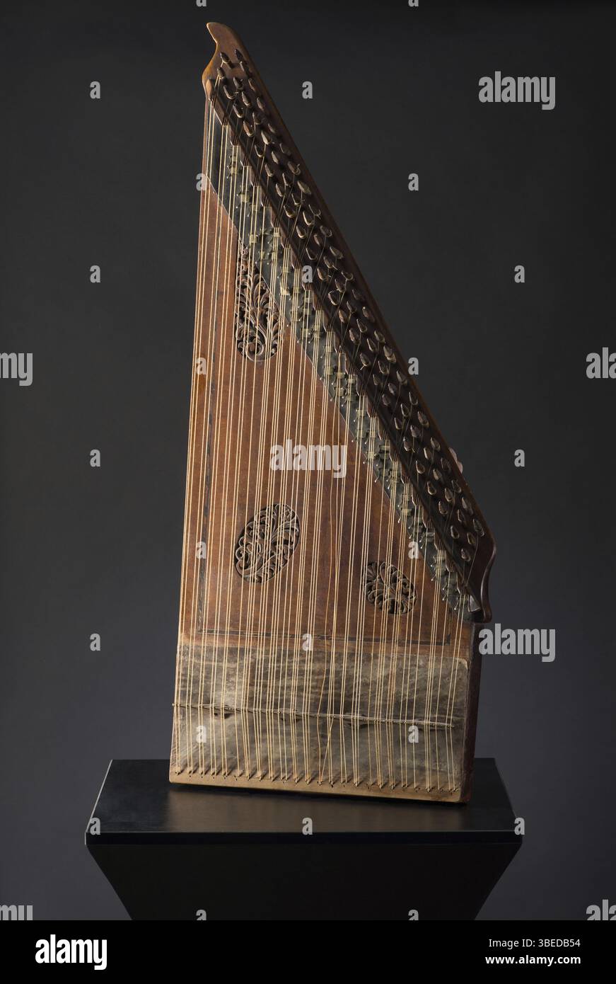 String Instruments Aisain Ancient Asian stringed musical instrument on black background with ...