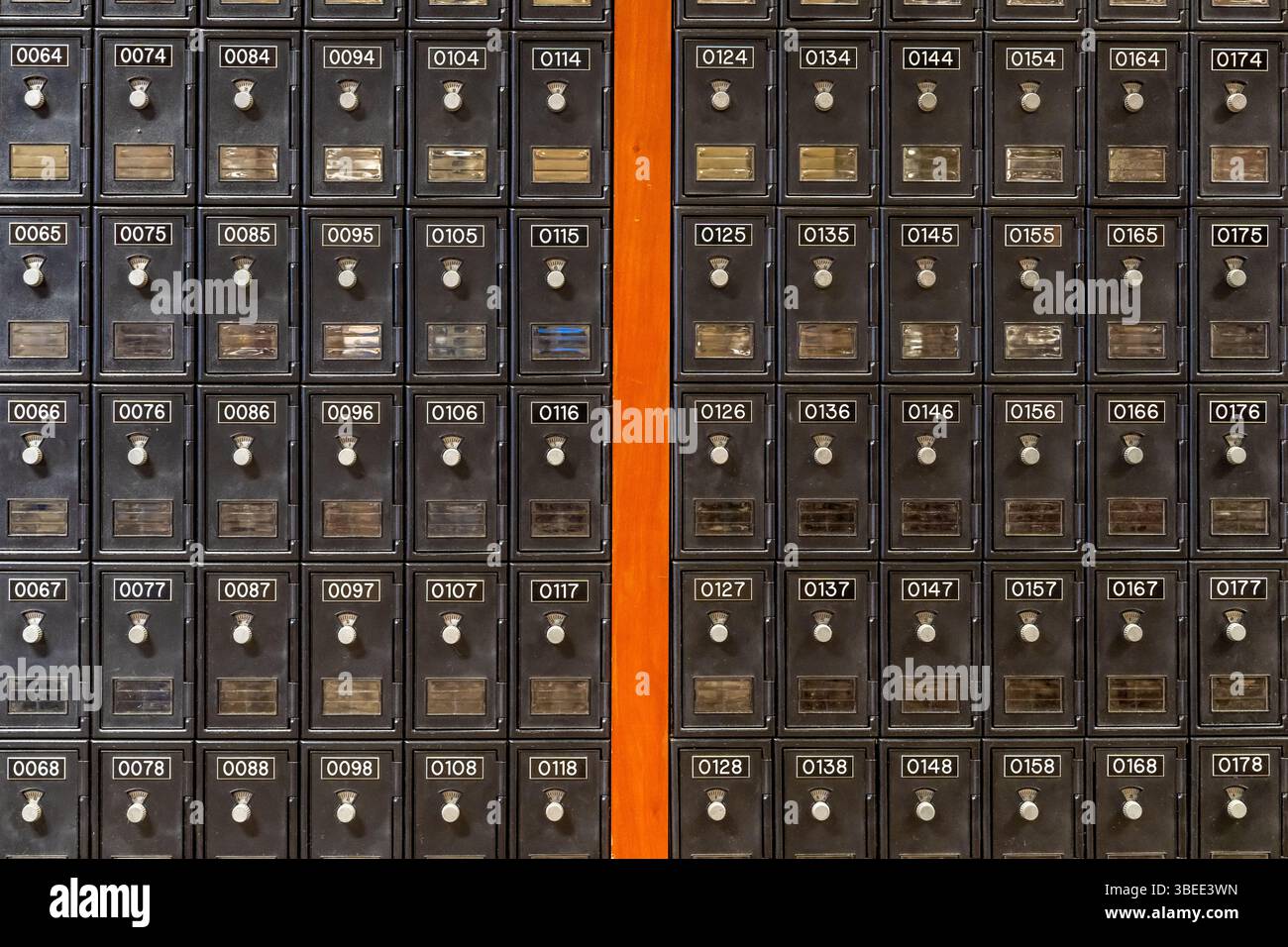 Photo of rows of numbered brown metal college, university campus mail ...
