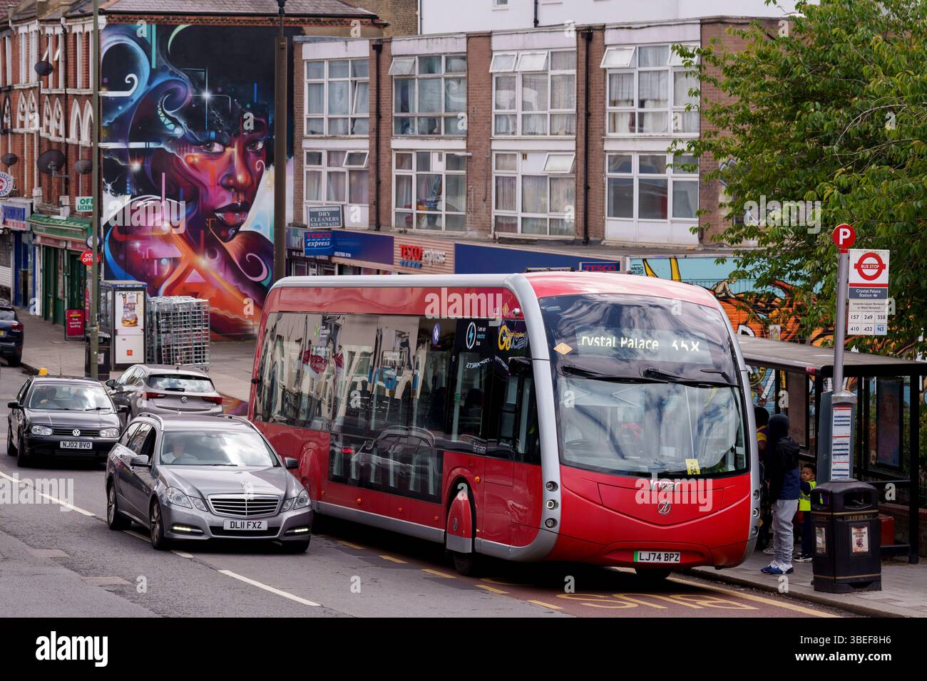 A Spanish-made Irizar tram (bus) halts at a stop on the Anerley Road on ...