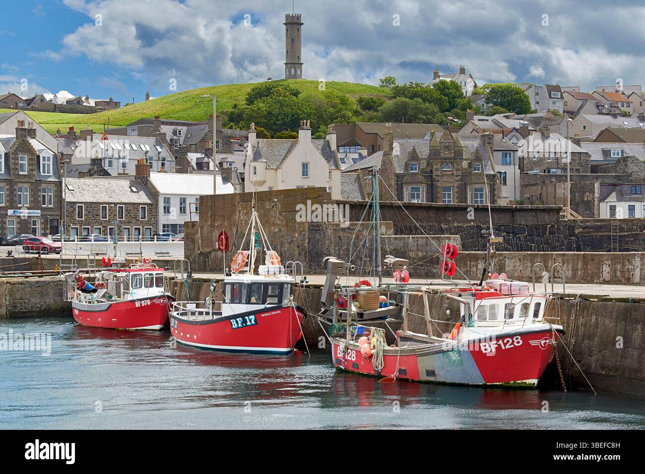 Macduff Aberdeenshire Scotland three small fishing boats moored or berthed in the harbour Stock Photo