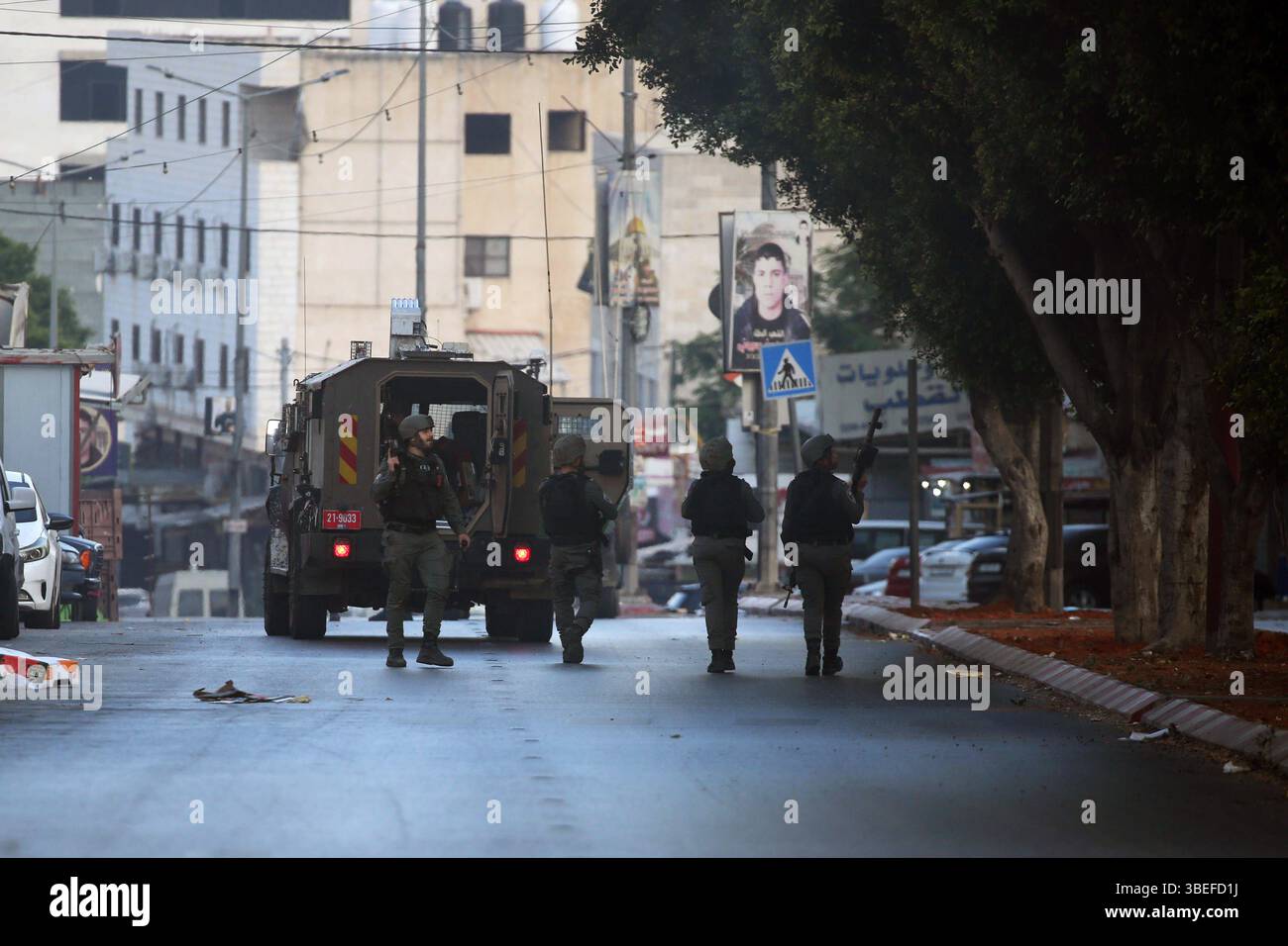 Israeli soldiers are deployed during a military operation in the West ...