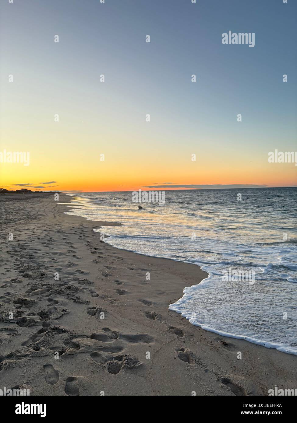 waves on the beach in Fire Island at sunrise - Smartphone Captured Stock Image