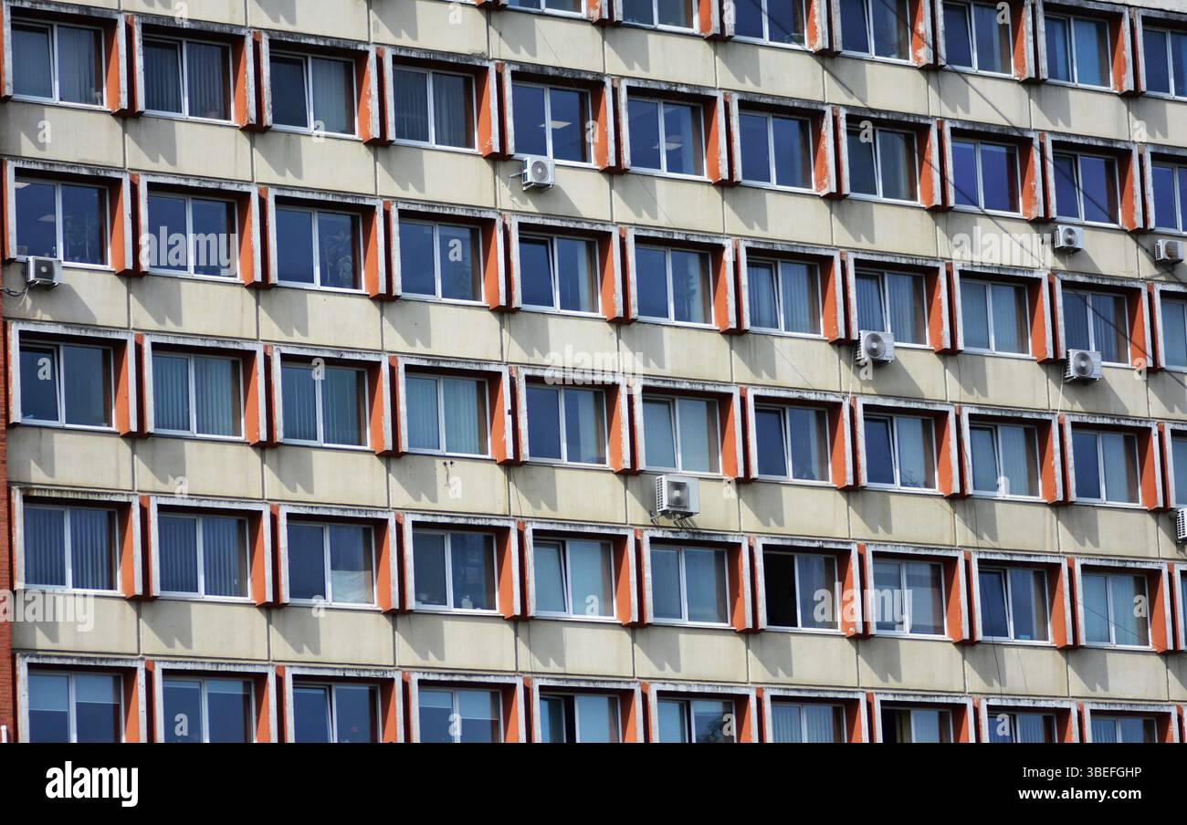 Facade of an old soviet residential, office building with repetitive ...
