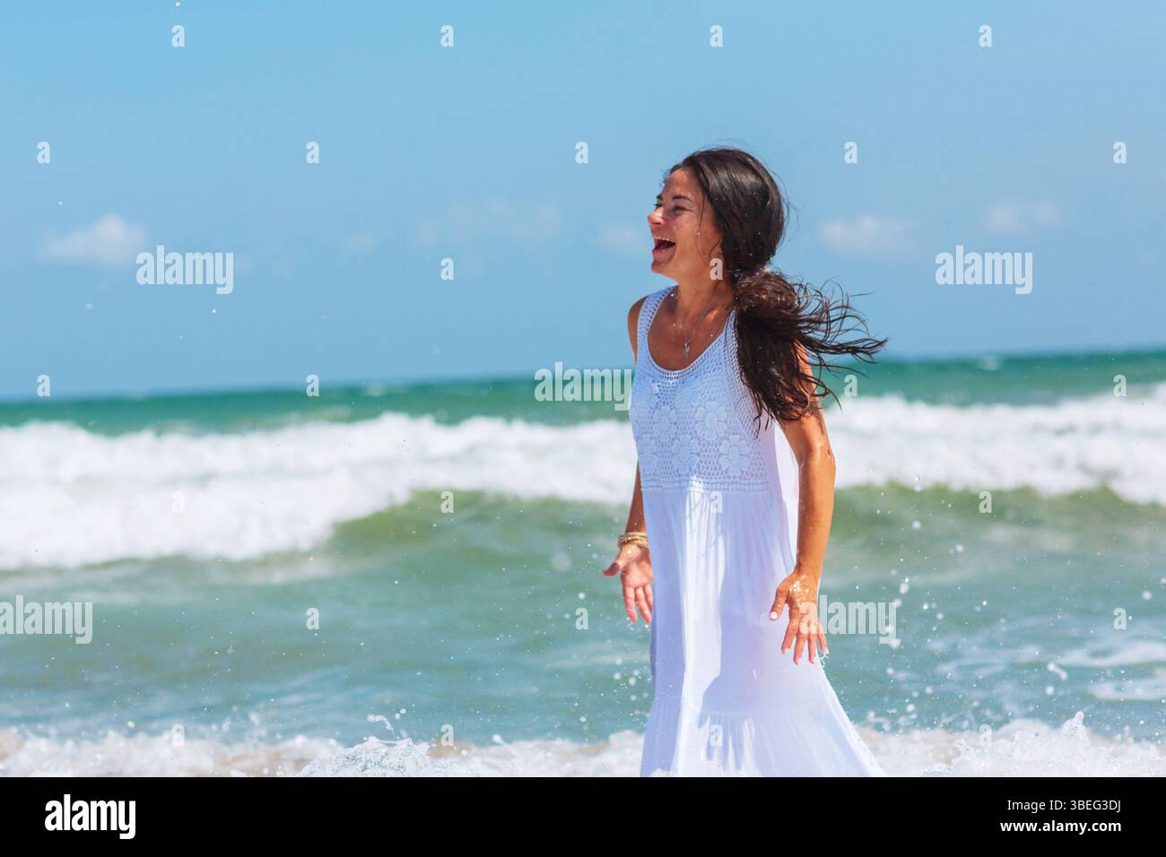 Mature woman sunbathing beach hi-res stock photography and images - Alamy