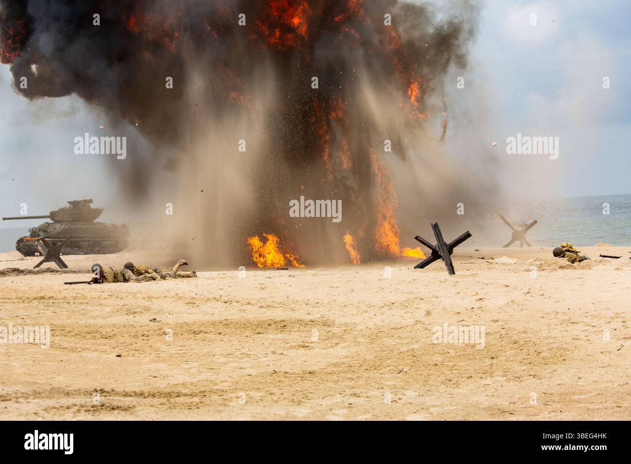 World War II historical reconstruction. Battlefield. Explosions, a tank ...