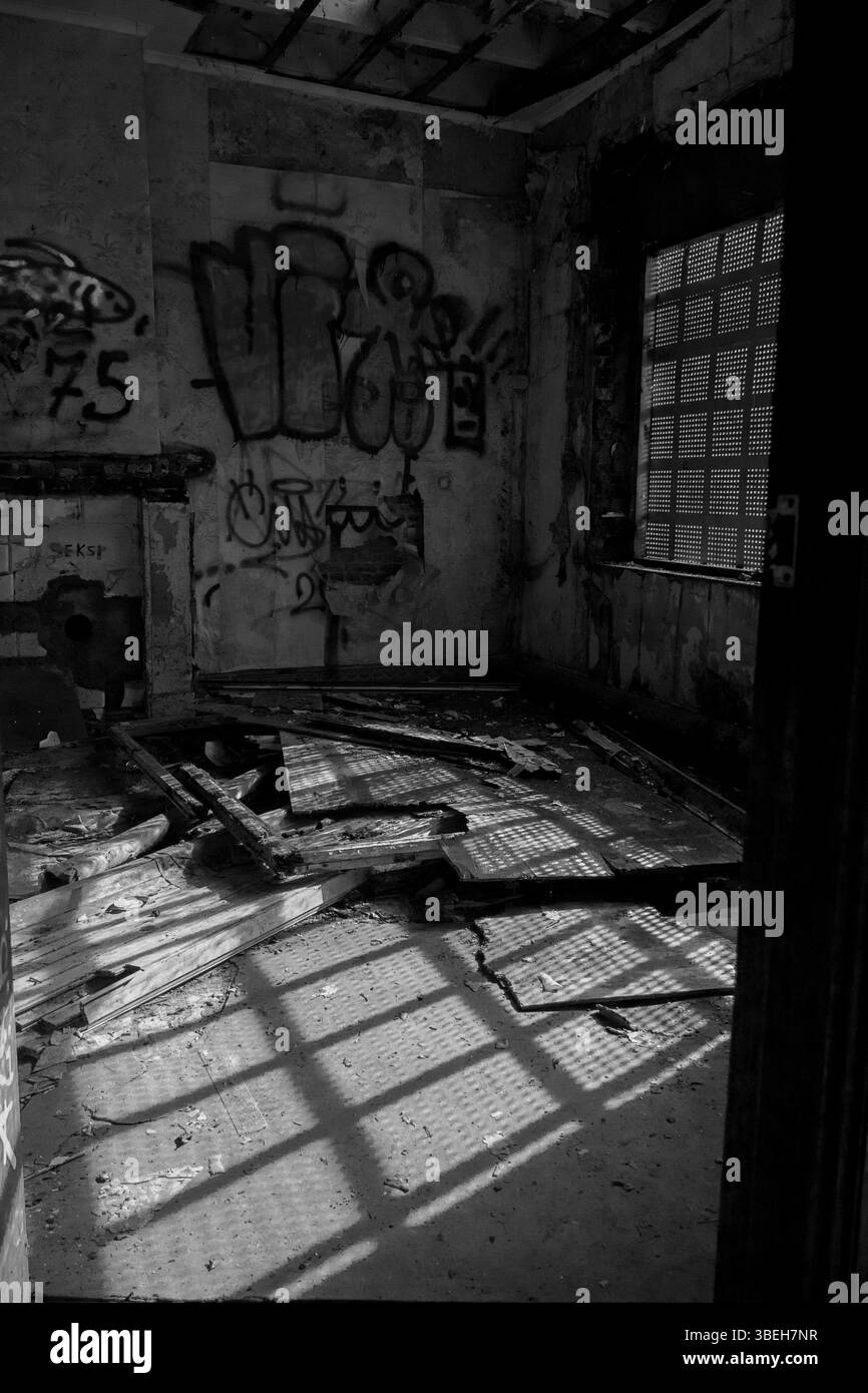 Neglectted Room Abandoned room with graffiti and shadows in a neglected building Stock ...