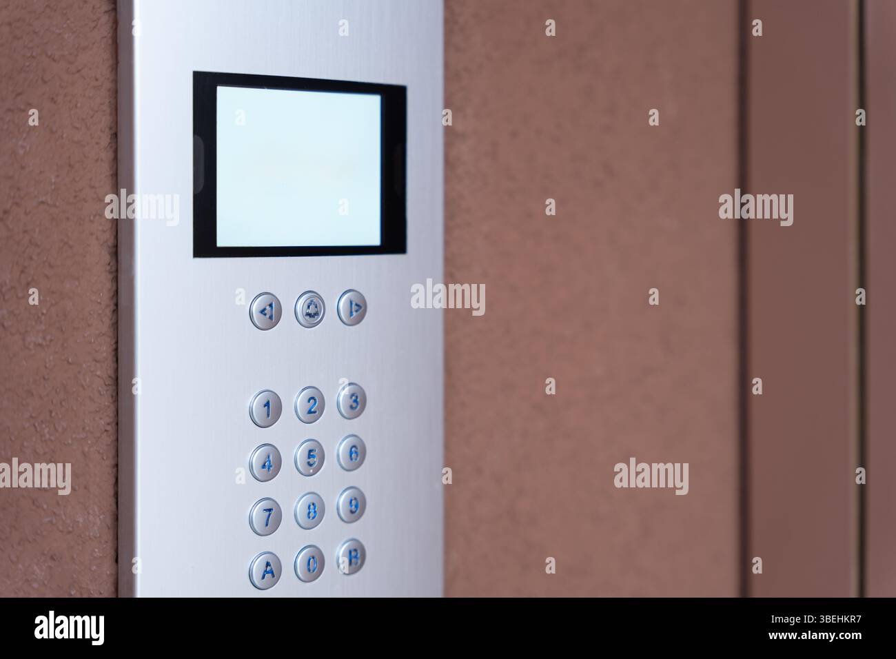 Intercom system with a keypad on building entrance Stock Photo - Alamy