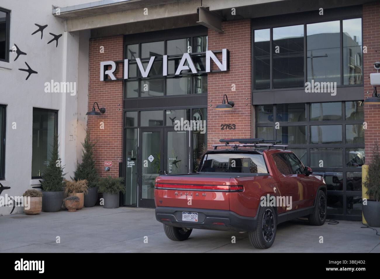 Rivian Automotive Logo Displayed At Denver Colorado Service Center Stock Photo