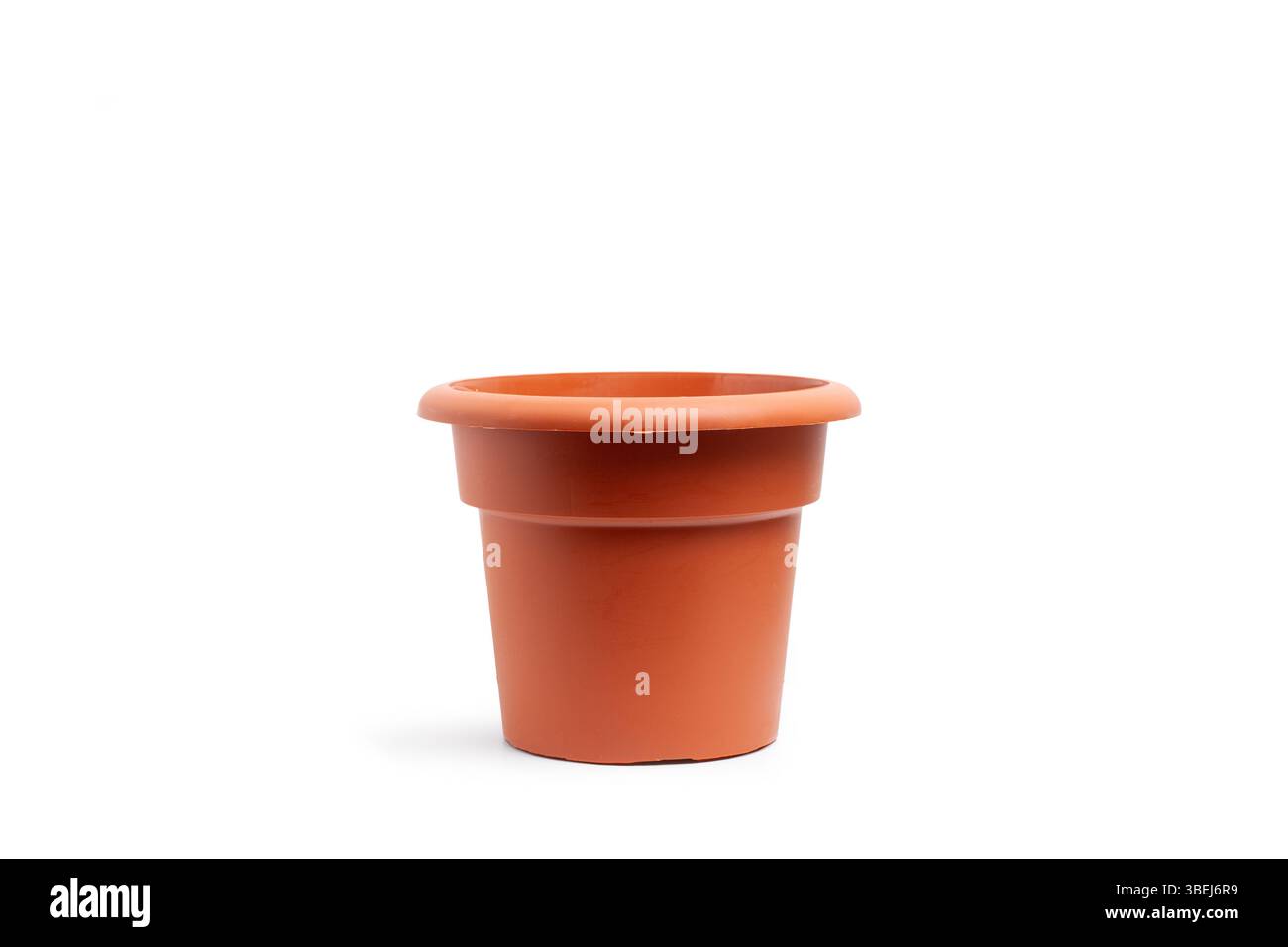 Empty plastic flower pot isolated on a white background Stock Photo