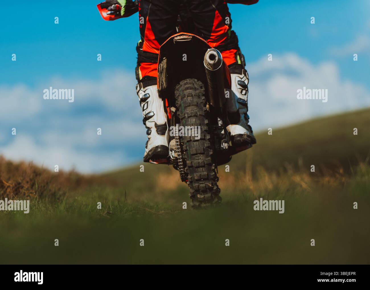 Professional enduro bike rider on action. Motocross sport Stock Photo ...