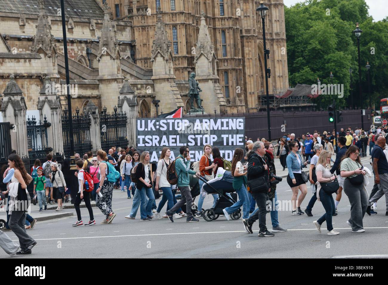 Two Protestors LONDON, ENGLAND, 29 May 2025: Two protestors are holding a giant ...