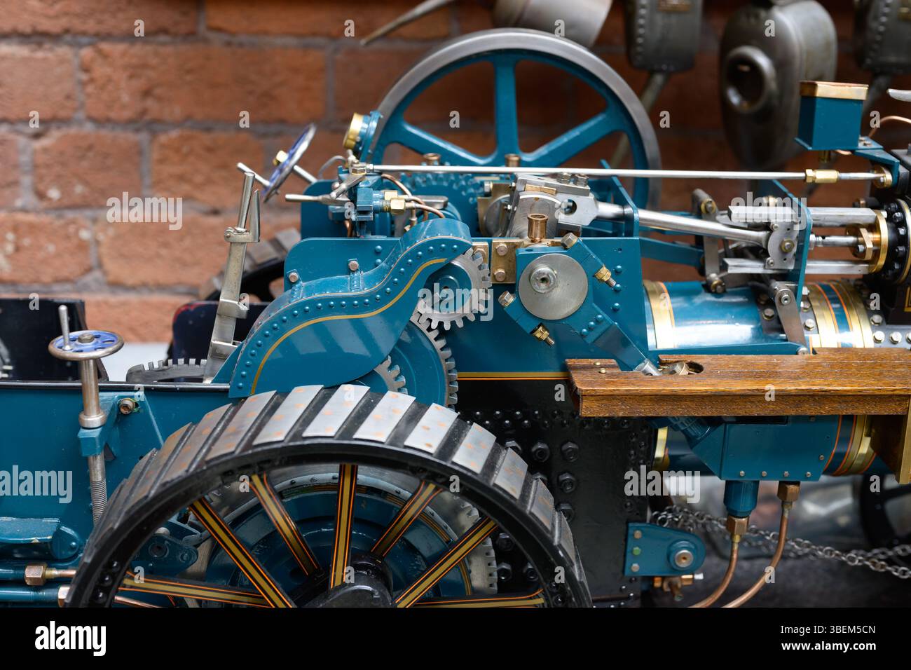 Vintage mechanical steam engine scale model with visible gears and ...