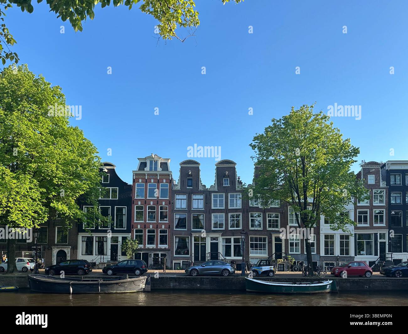 Canals with historic canal houses in summertime on beautiful sunny day. postcards for travel in Europe, The Netherlands. - Smartphone Captured Stock Image