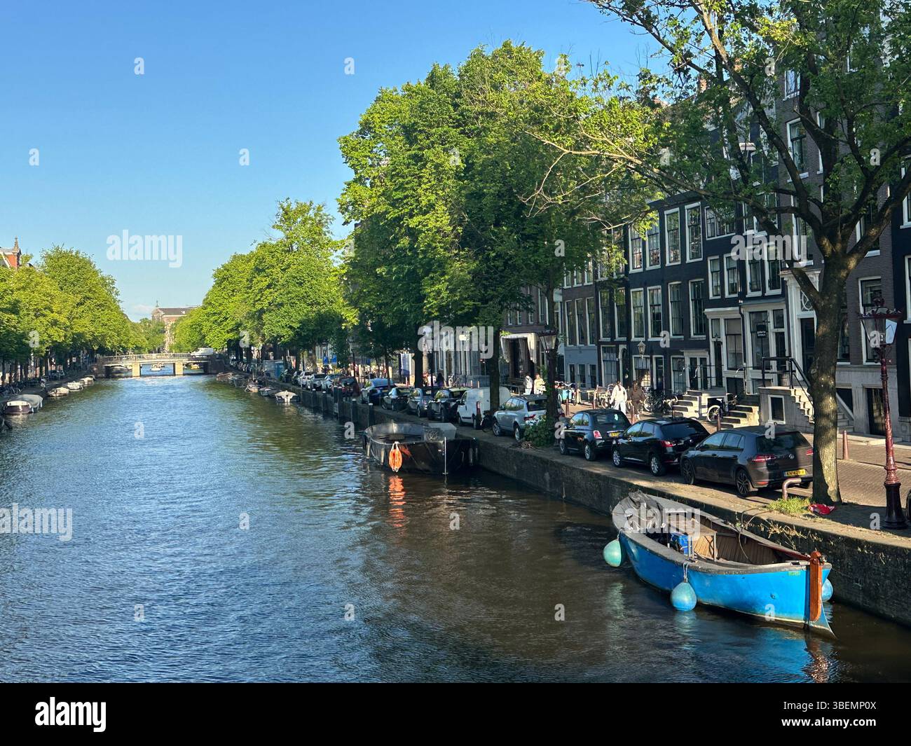 Canals with historic canal houses in summertime on beautiful sunny day. postcards for travel in Europe, The Netherlands. - Smartphone Captured Stock Image
