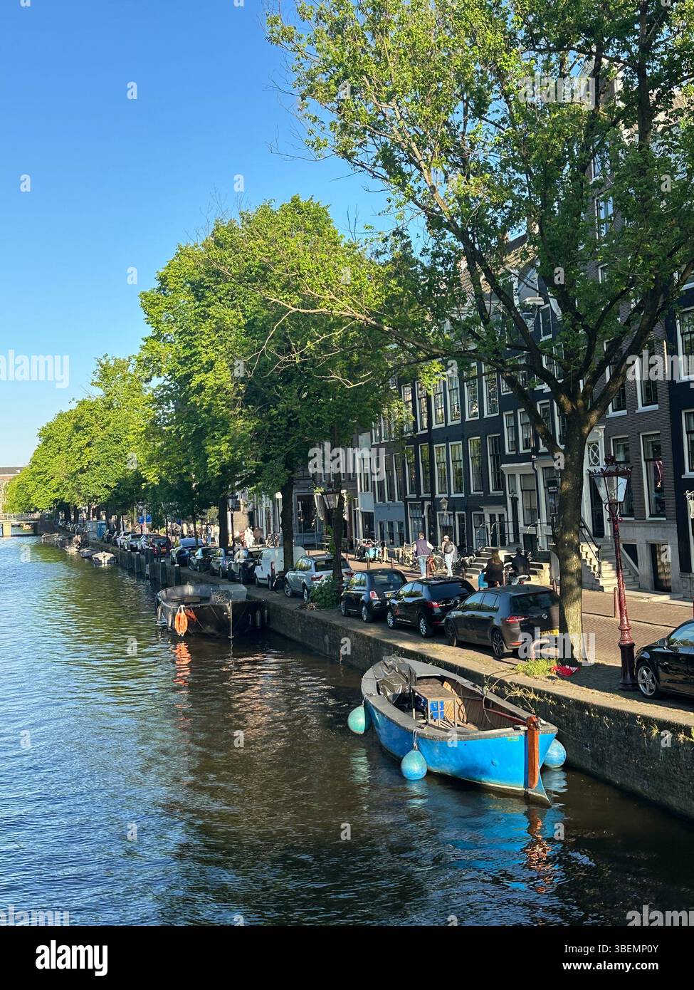 Canals with historic canal houses in summertime on beautiful sunny day. postcards for travel in Europe, The Netherlands. - Smartphone Captured Stock Image