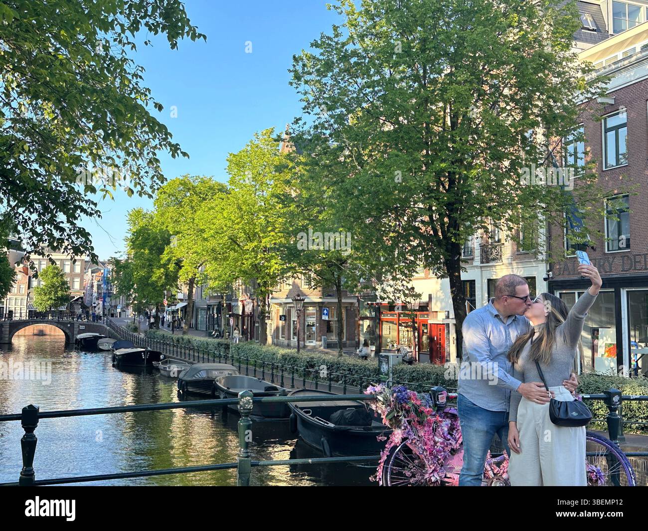 Canals with historic canal houses in summertime on beautiful sunny day. postcards for travel in Europe, The Netherlands. - Smartphone Captured Stock Image