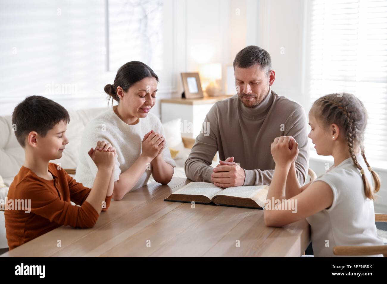 Family bible praying table hi-res stock photography and images - Alamy