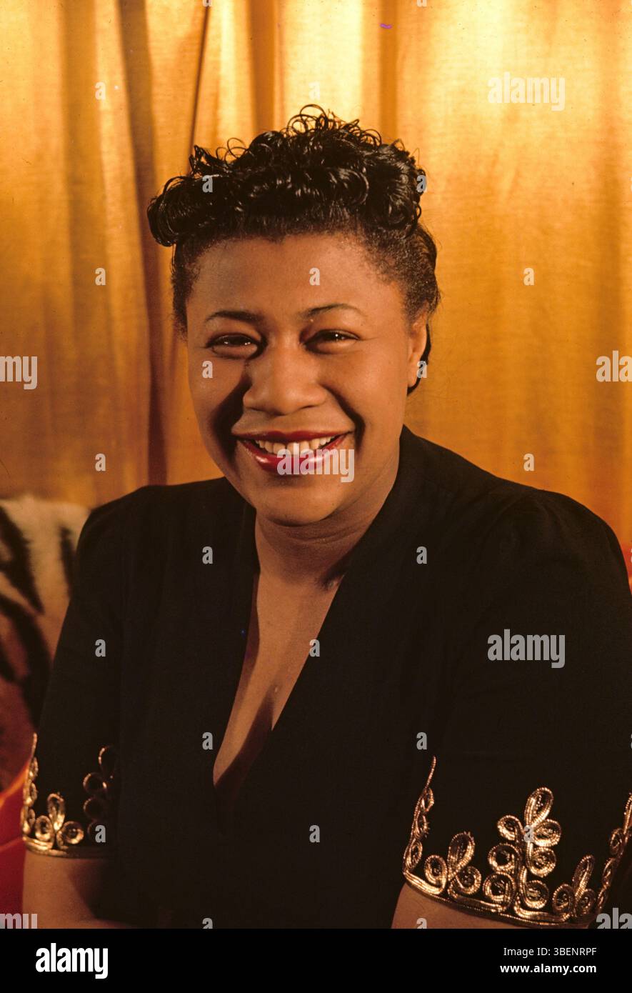 Kodachrome photo of Ella Fitzgerald taken by Carl Van Vechten. Ella Jane Fitzgerald (April 25, 1917 – June 15, 1996) was an American singer, songwriter and composer, sometimes referred to as the "First Lady of Song", "Queen of Jazz", and "Lady Ella". She was noted for her purity of tone, impeccable diction, phrasing, timing, intonation, absolute pitch, and a "horn-like" improvisational ability. Stock Photo