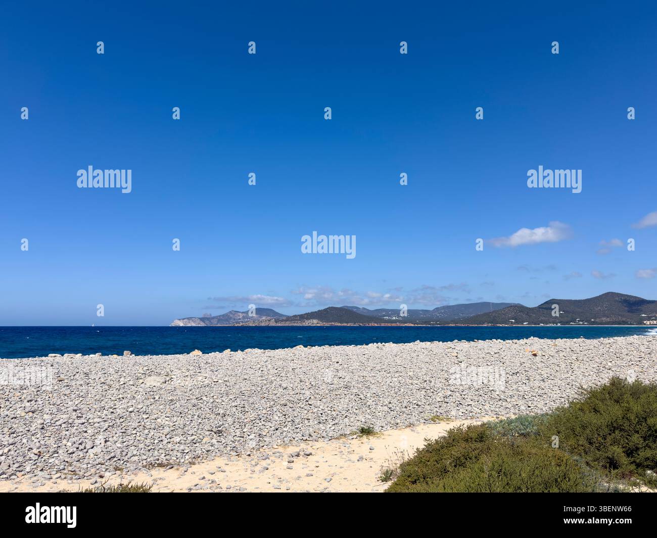 Remote coastal track Camino Cap des Falcó, with dramatic sky and rugged landscape, Ibiza, Balearic Islands, Spain - Smartphone Captured Stock Image