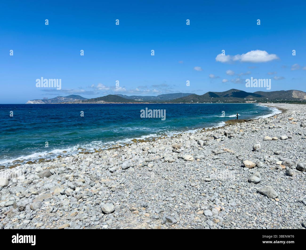 Remote coastal track Camino Cap des Falcó, with dramatic sky and rugged landscape, Ibiza, Balearic Islands, Spain - Smartphone Captured Stock Image
