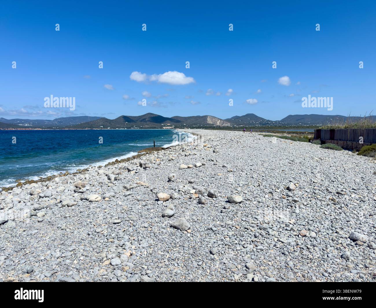 Remote coastal track Camino Cap des Falcó, with dramatic sky and rugged landscape, Ibiza, Balearic Islands, Spain - Smartphone Captured Stock Image