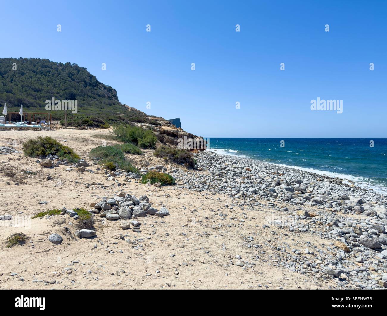 Remote coastal track Camino Cap des Falcó, with dramatic sky and rugged landscape, Ibiza, Balearic Islands, Spain - Smartphone Captured Stock Image