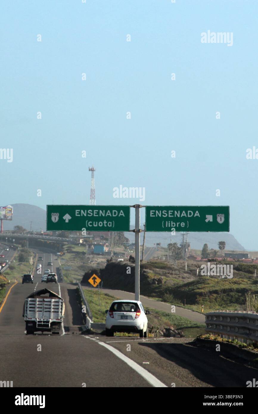 Panoramic Sign Ensenada, Baja California, Mexico - Mar 14 2025: Road signs on the ...