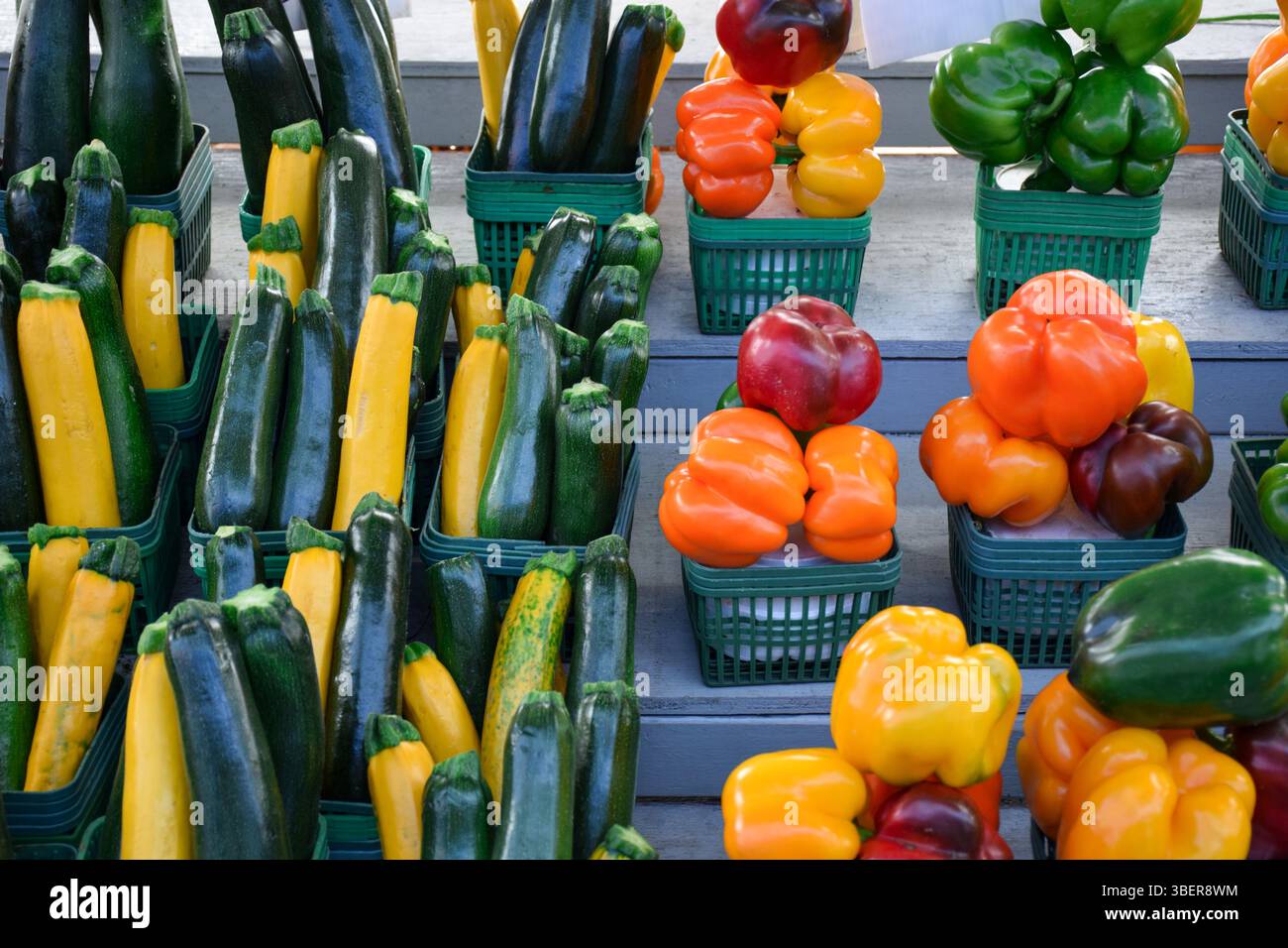 Farmers market stand with zucchini and bell peppers display Stock Photo ...