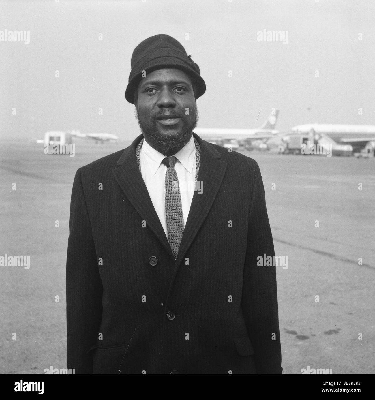 February 14, 1964,  Amsterdam Netherlands. Portrait of Thelonious Monk (jazz pianist)  upon arrival at Schiphol  . Archive Photograph of American Jazz Musicians.  Source: Nationaal Archief Stock Photo