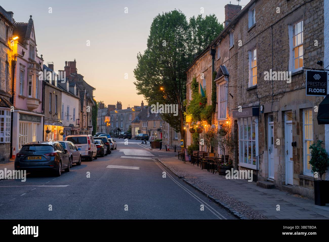 High street at dusk. Woodstock, Oxfordshire, England Stock Photo