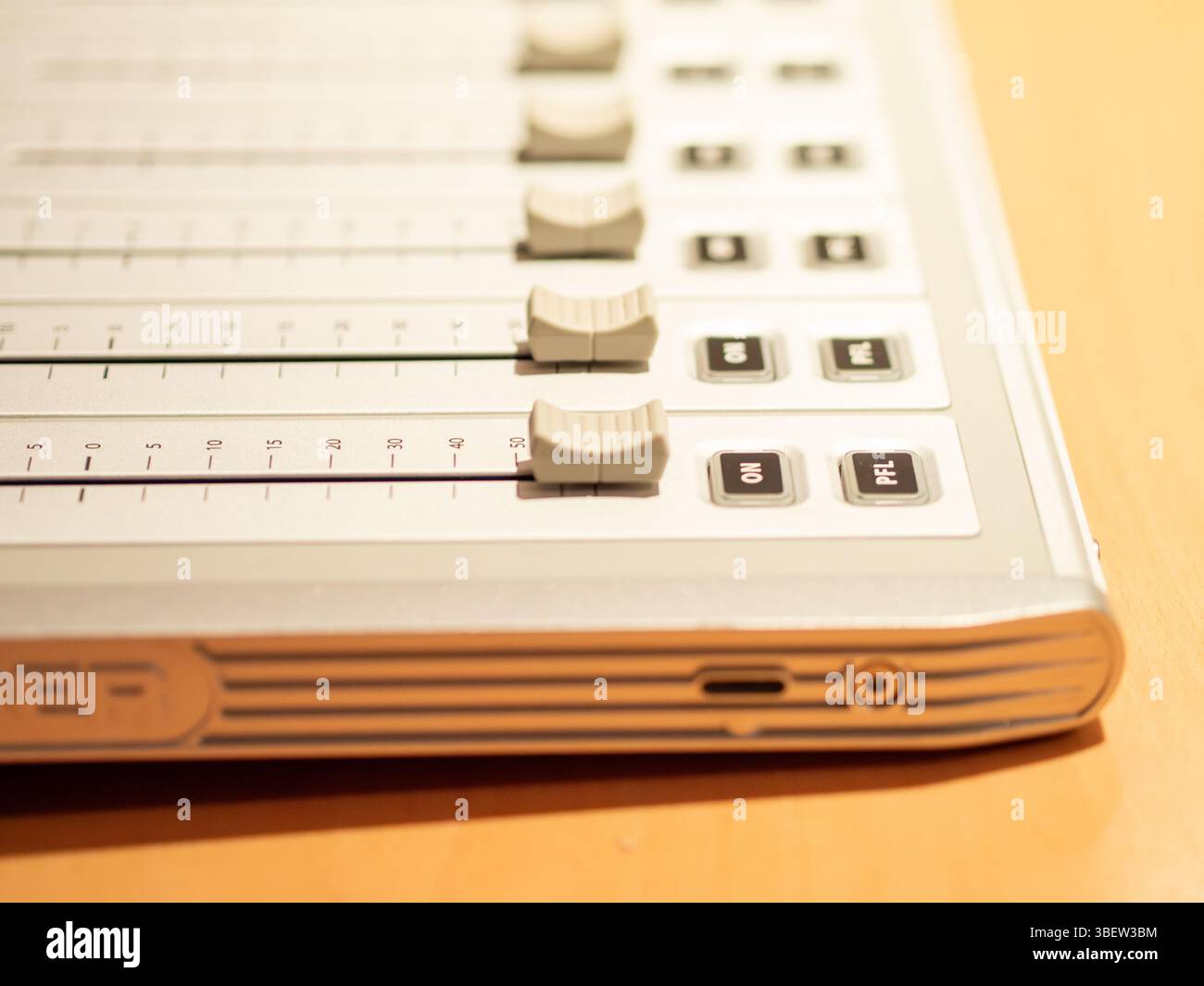 Engineer adjusting knobs on interface hi-res stock photography and ...