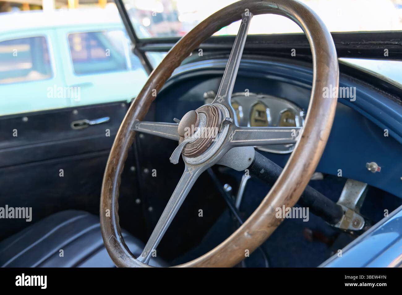 vintage wooden timber car steering wheel, antique classic automobile history Stock Photo