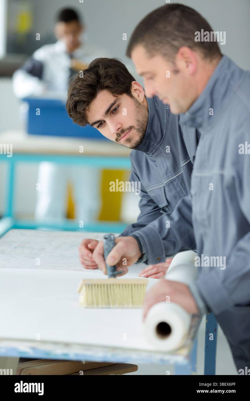 portrait of painter with apprentice Stock Photo