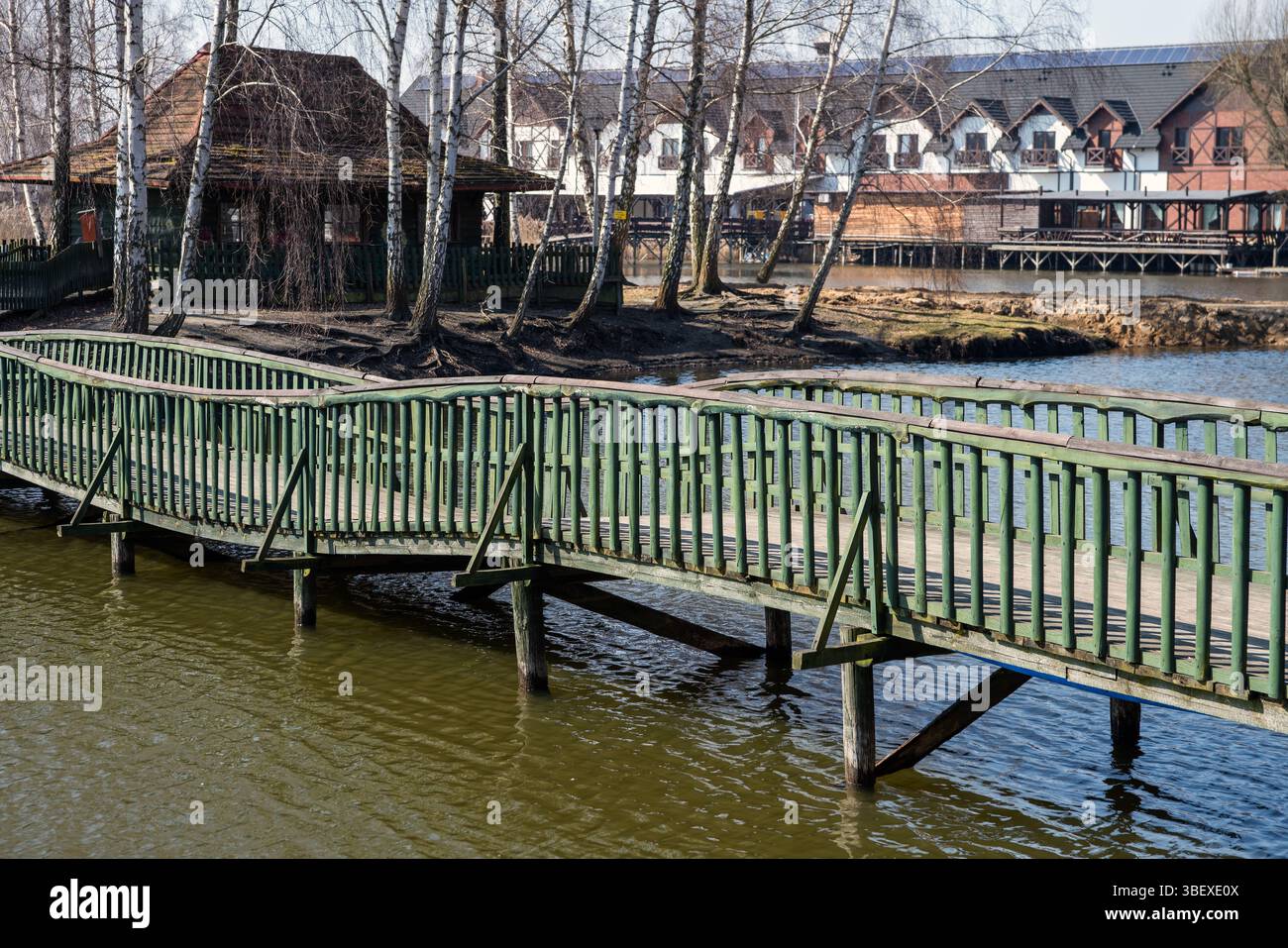Przygodzice, Górecznik, Greater Poland; a small wooden bridge to a cottage surrounded by birch trees; eine kleine Holzbrücke zur Holzhütte; 2018 Stock Photo