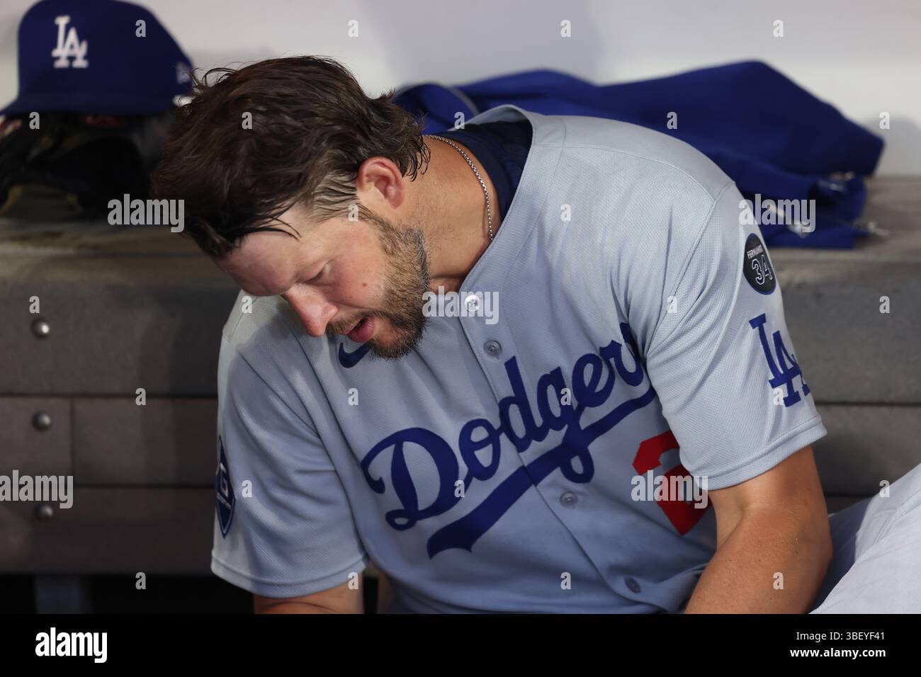 Los Angeles Dodgers starting pitcher Clayton Kershaw #22 sits in the dugout before the baseball game against the New York Mets at Citi Field in Corona, N.Y., Friday, May 23, 2025. (Photo: Gordon Donovan) Stock Photo