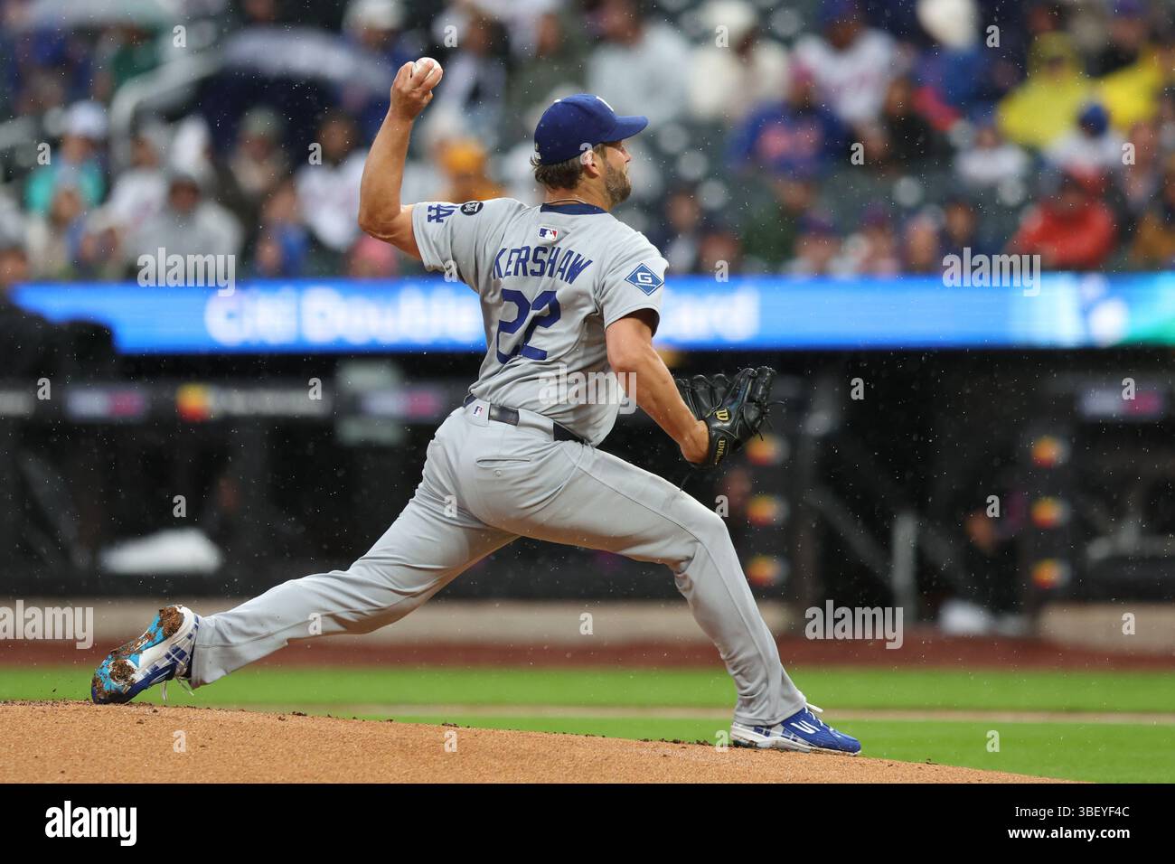 Los Angeles Dodgers starting pitcher Clayton Kershaw #22 throws during the first inning of a baseball game against the New York Mets at Citi Field in Corona, N.Y., Friday, May 23, 2025. (Photo: Gordon Donovan) Stock Photo