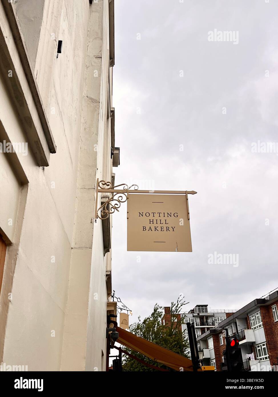 An aesthetic photo of the Notting Hill Bakery sign in Notting Hill, London, England, United Kingdom, Europe on a cloudy day. - Smartphone Captured Stock Image
