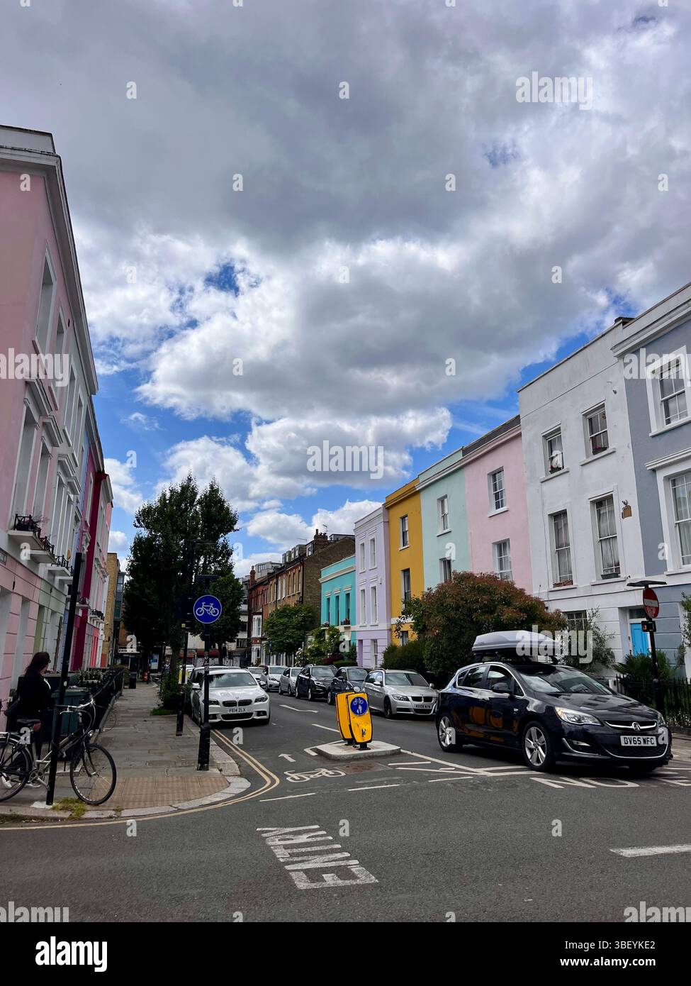 The aesthetic pastel coloured buildings in Kentish Town, London, England, United Kingdom, Europe on a sunny day in Spring of 2025. - Smartphone Captured Stock Image