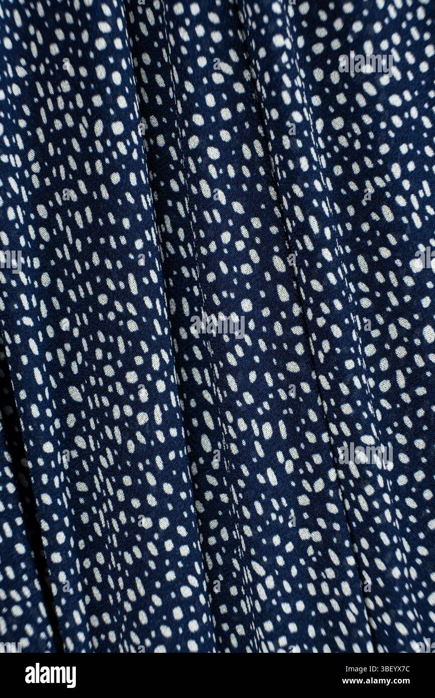 Blue Polyester Fabric with White Spots Stock Photo