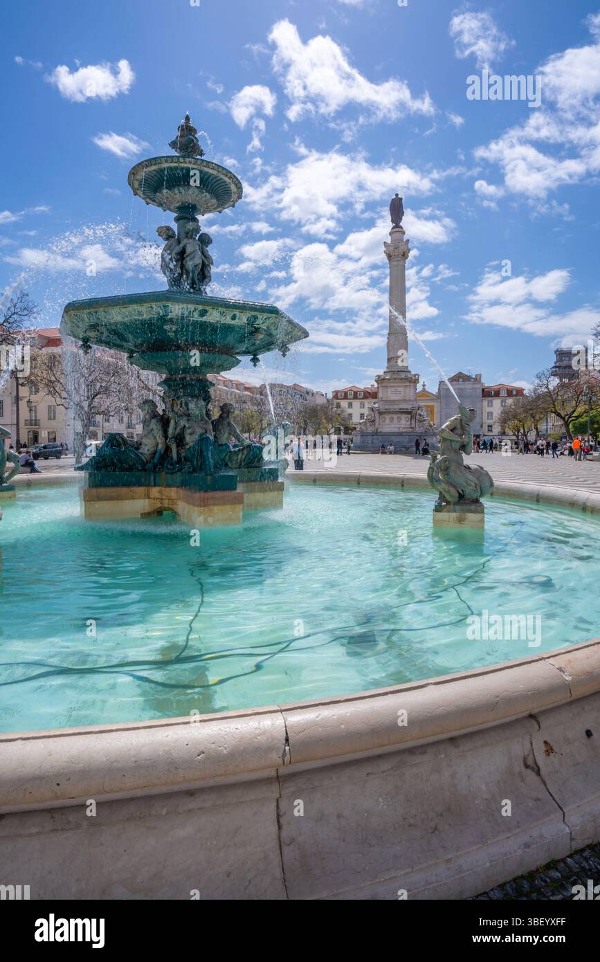View of North fountain of Rossio in Praca do Rossio on a sunny day in Lisbon city centre, Lisbon, Portugal, Europe Stock Photo