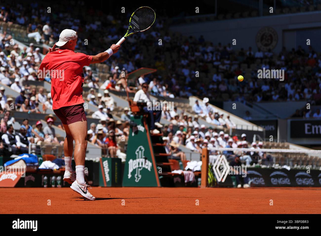 Denmark's Holger Rune returns the ball to France's Quentin Halys during ...