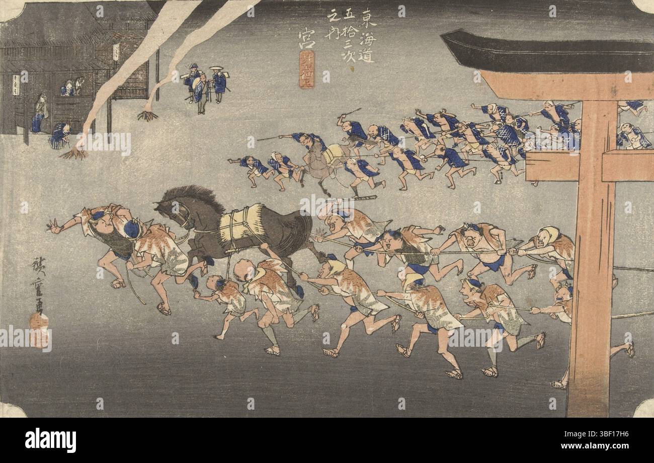Tokyo, Takenouchi Magohachi (Hoeido), Japan, Hiroshige (I), Utagawa, Tokaido gojusan tsugi no uchi, The 53 stations of the Tokaido, Miya, Atsuta shinji, Shintoistic ceremony at the Atsuta shrine, Two groups of men, clinging to ropes attached to powered horses; in the foreground a toriii; on, print, Japan (collection), Hiroshige ga, height 225 mm, width 346 mm, Japanese, 1797 - 1858, printmaker, 1828 - 1835, second quarter 19th century, paper, nishiki-e, colour woodcut, Publication (Event), Publication, publisher Stock Photo
